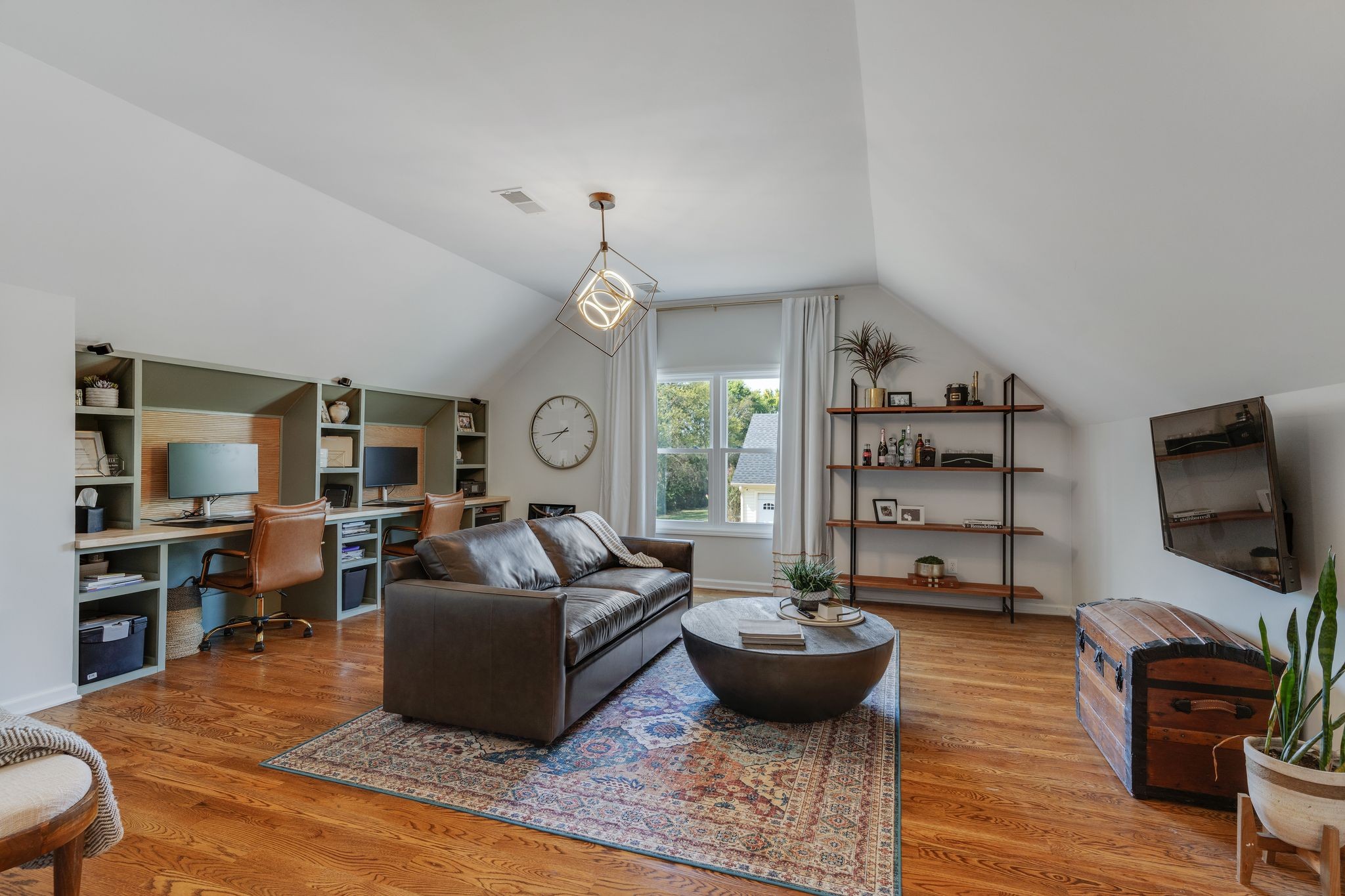 1055 Franklin Road Gallatin, TN 37066 - Photo 36 of 60 a living room with furniture and a flat screen tv