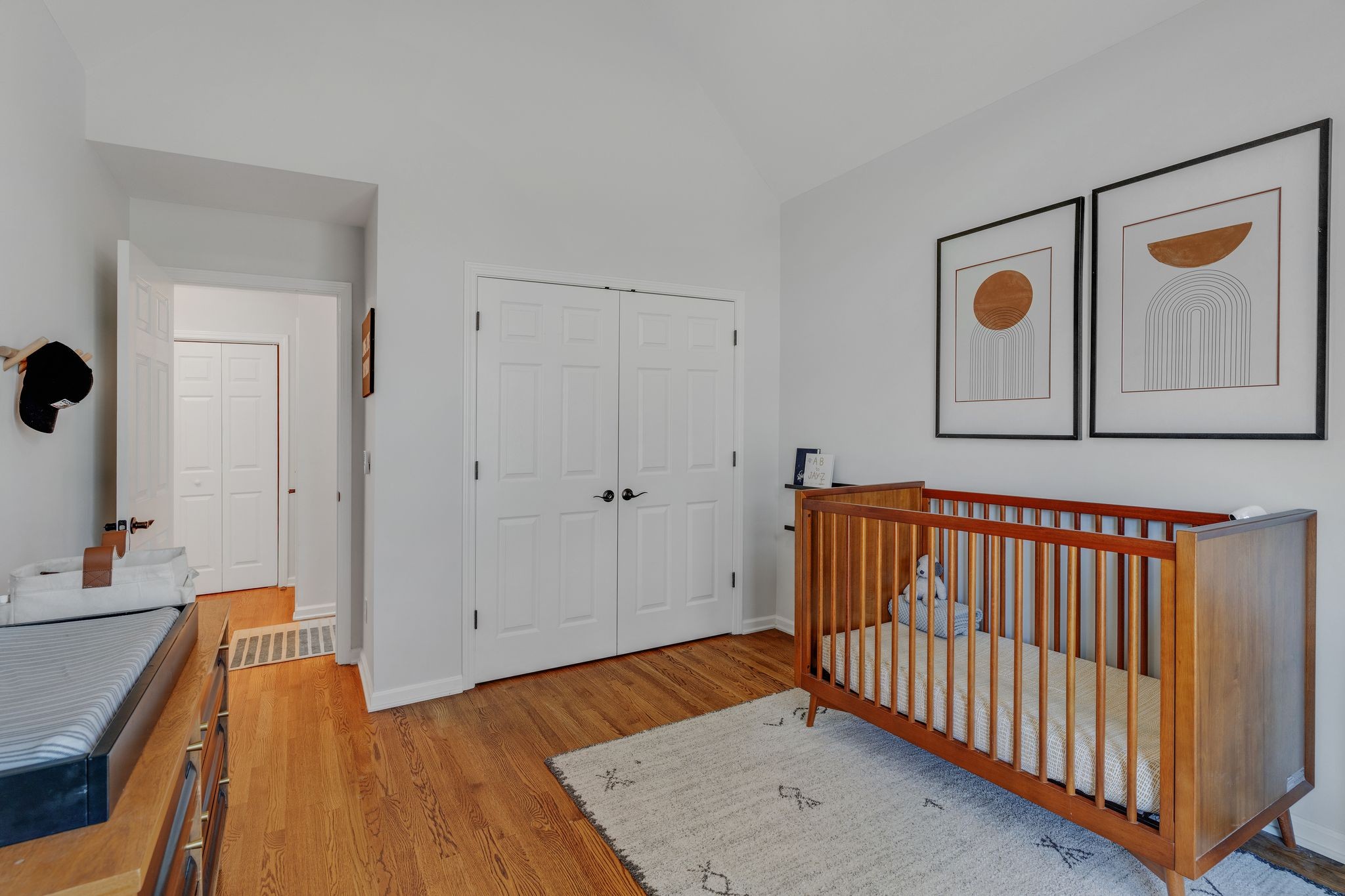 1055 Franklin Road Gallatin, TN 37066 - Photo 46 of 60 a view of a hallway with wooden floor and mirror