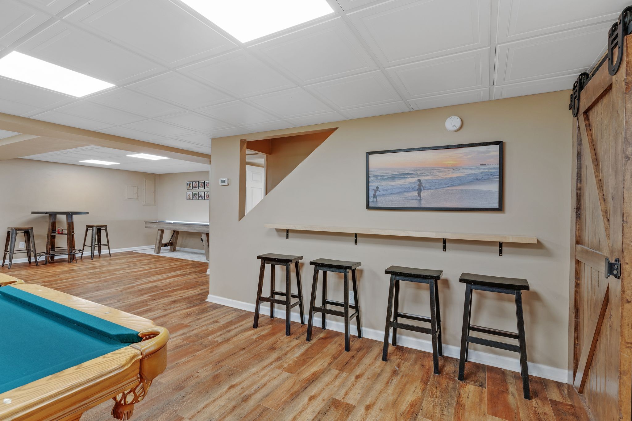 1055 Franklin Road Gallatin, TN 37066 - Photo 48 of 60 a living room with furniture wooden floor and a flat screen tv