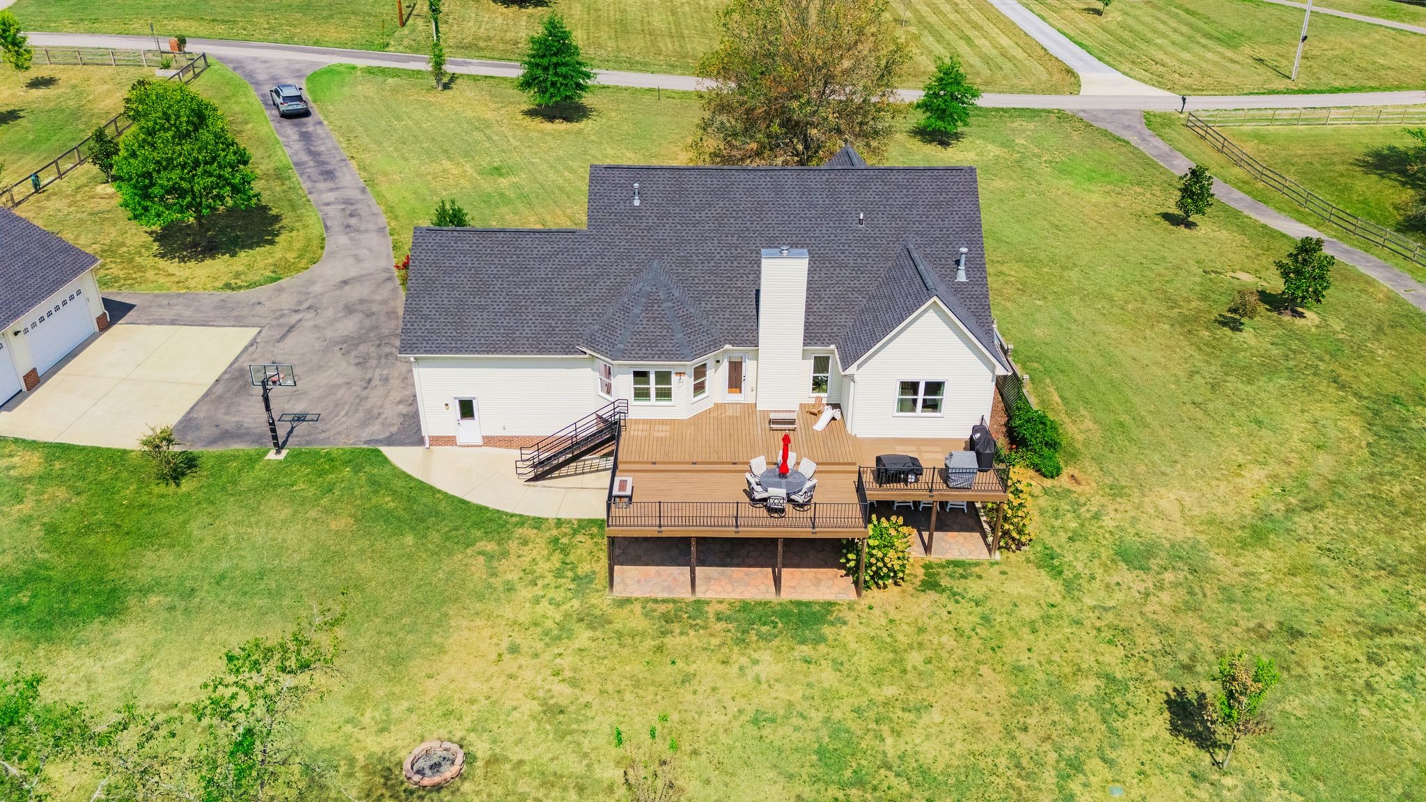 1055 Franklin Road Gallatin, TN 37066 - Photo 10 of 60 an aerial view of a house with a yard and sitting area