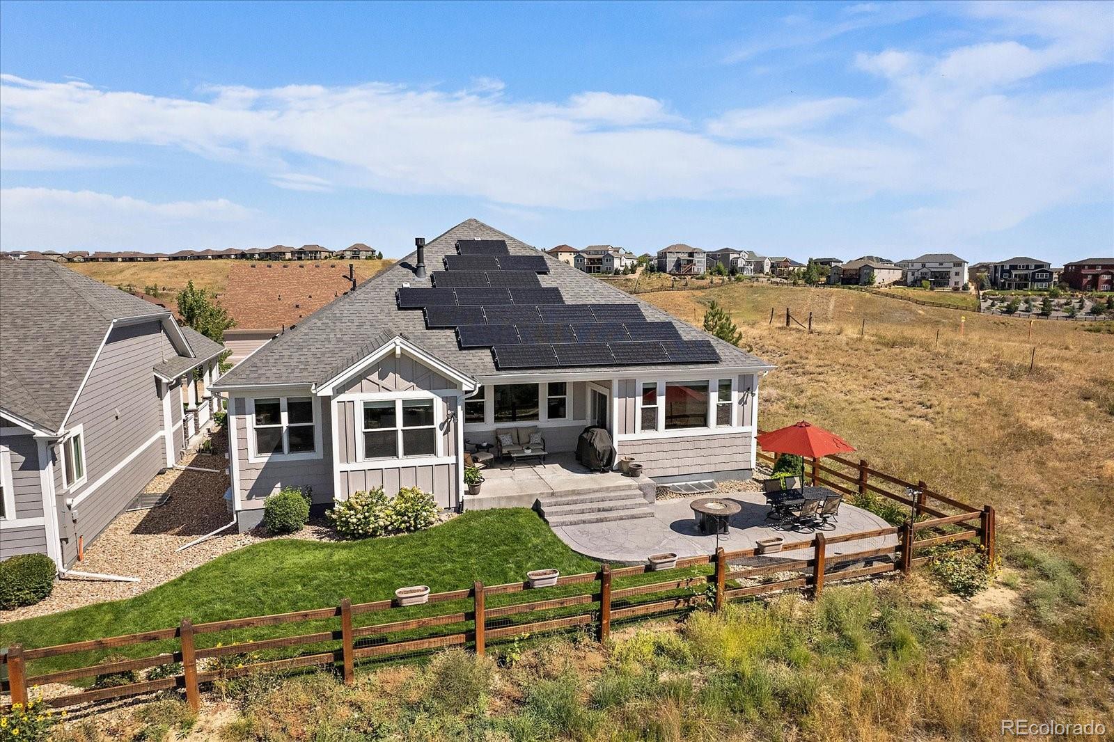 8412 Quaker Circle Arvada, CO 80007 - Photo 33 of 44 a house that has sitting area in front of it