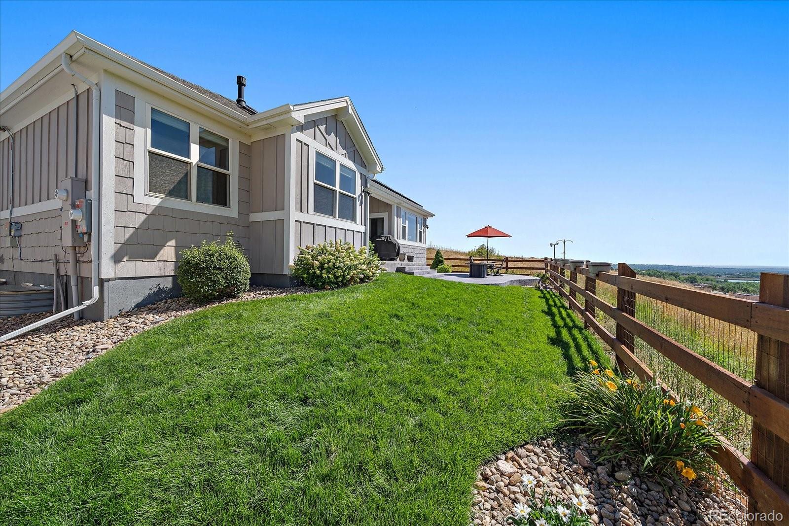 8412 Quaker Circle Arvada, CO 80007 - Photo 39 of 44 a front view of a house with a yard