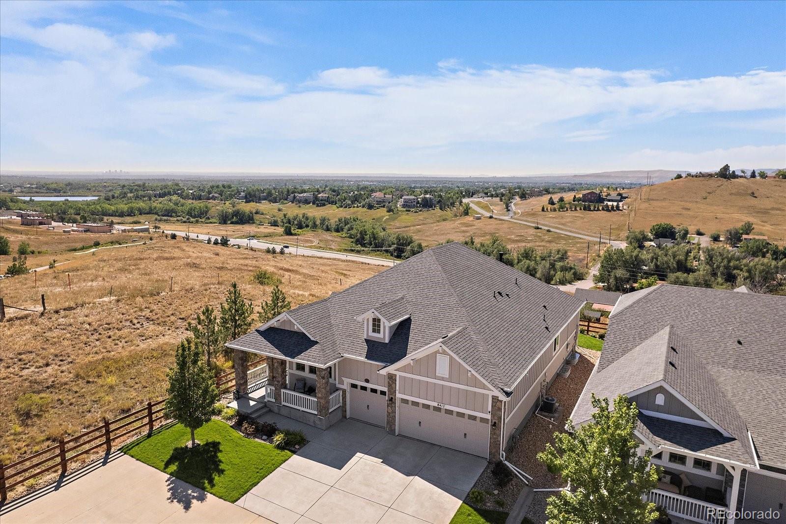 8412 Quaker Circle Arvada, CO 80007 - Photo 6 of 44 an aerial view of residential houses with outdoor space and ocean