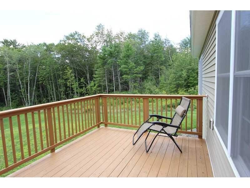 49 Highland Ridge Drive, Unit 49 Hampden, ME 04444 - Photo 31 of 34 Patio/Deck.