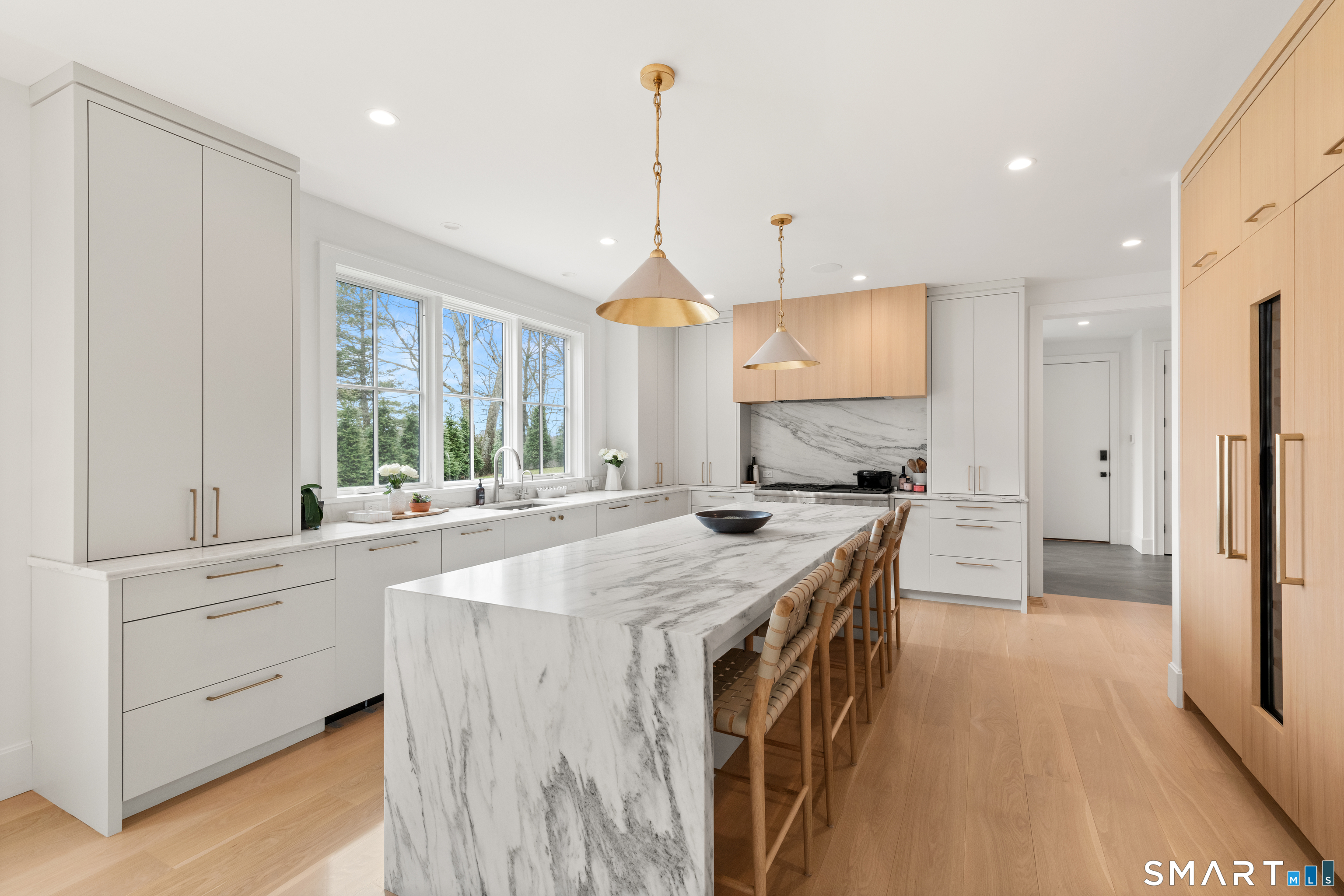 19 Mortar Rock Road Westport, CT 06880 - Photo 12 of 39 a kitchen with granite countertop a sink a counter space appliances and cabinets