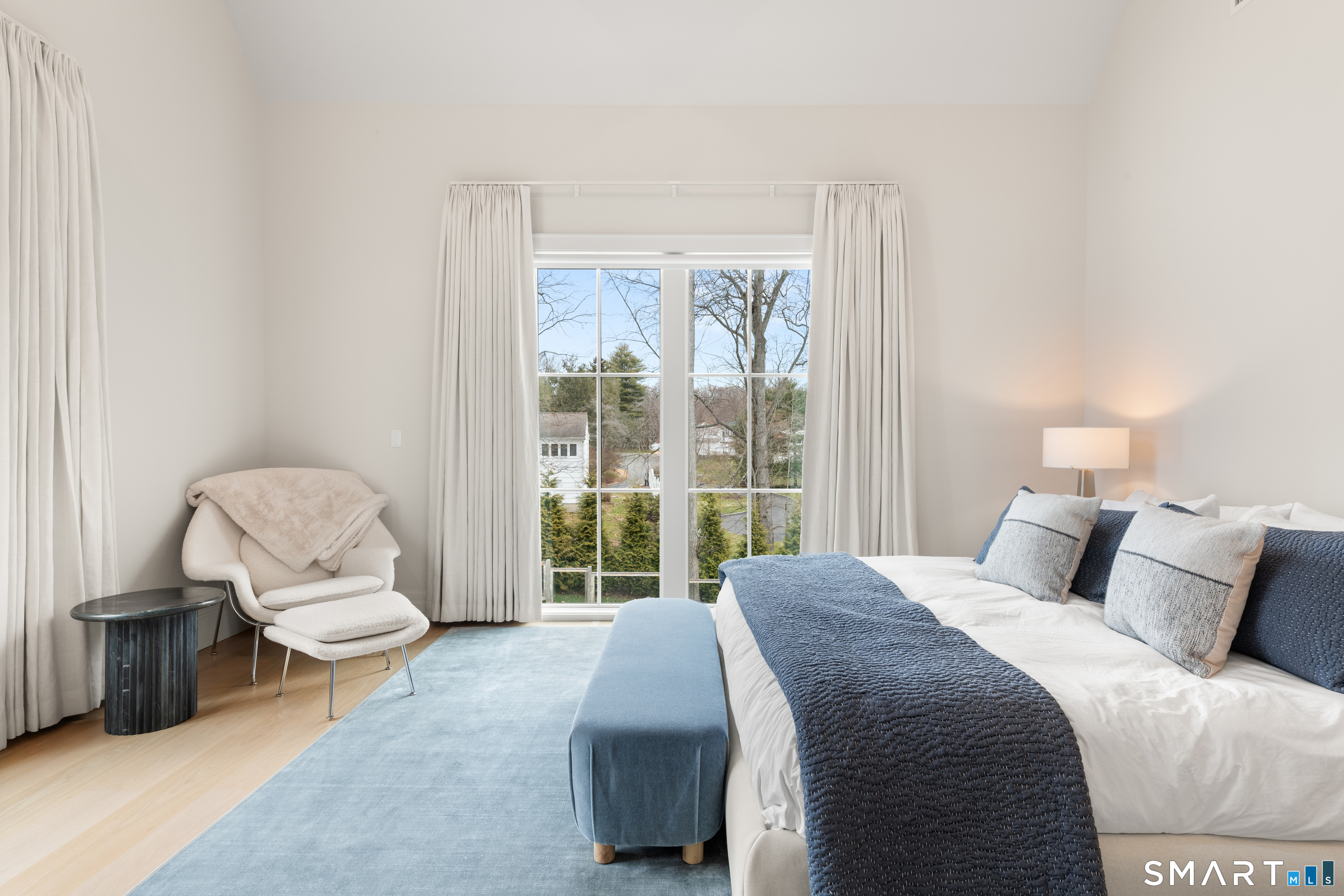 19 Mortar Rock Road Westport, CT 06880 - Photo 30 of 39 a bedroom with a bed and large window