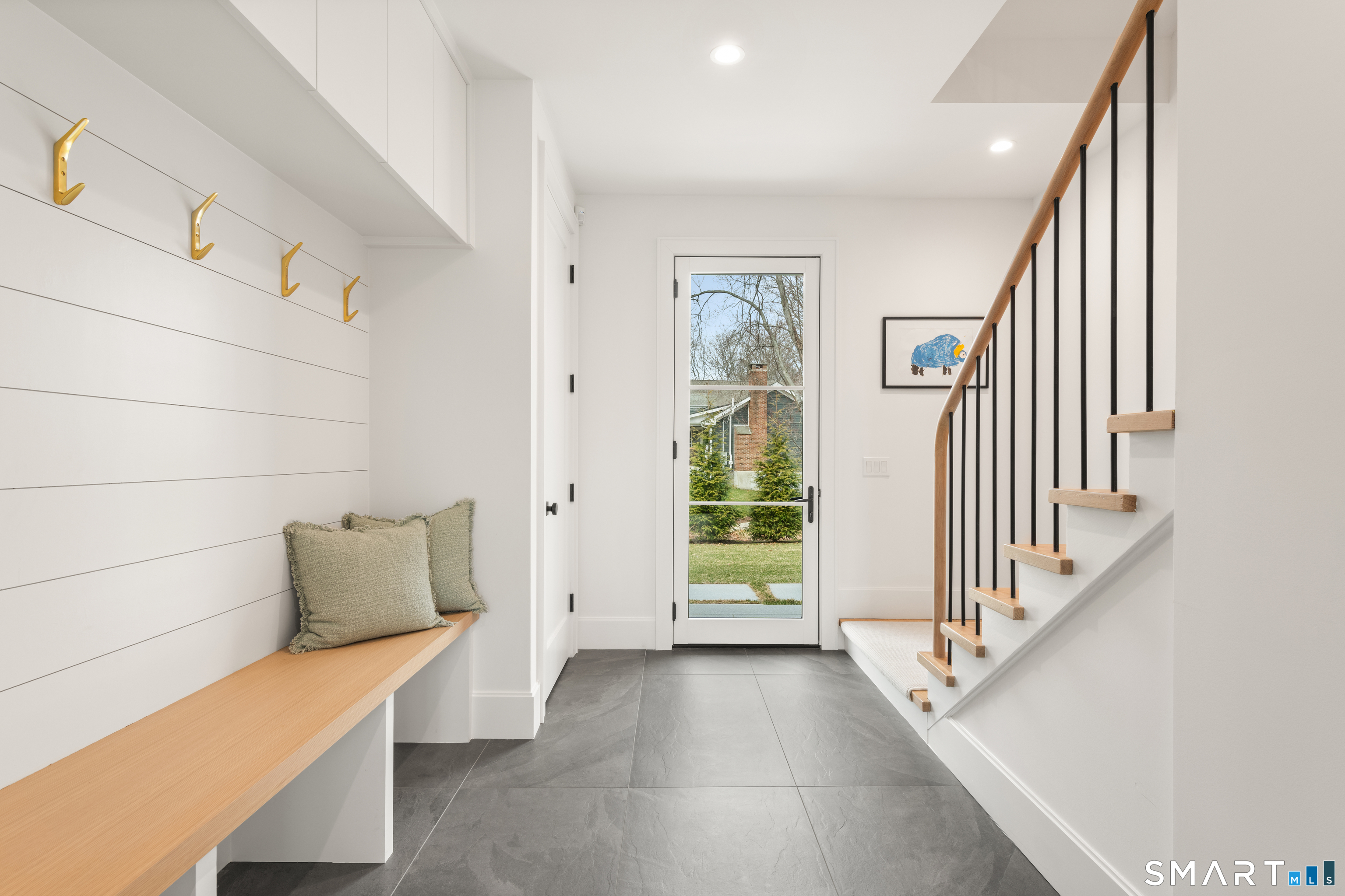 19 Mortar Rock Road Westport, CT 06880 - Photo 35 of 39 a view of hallway with stairs and wooden floor