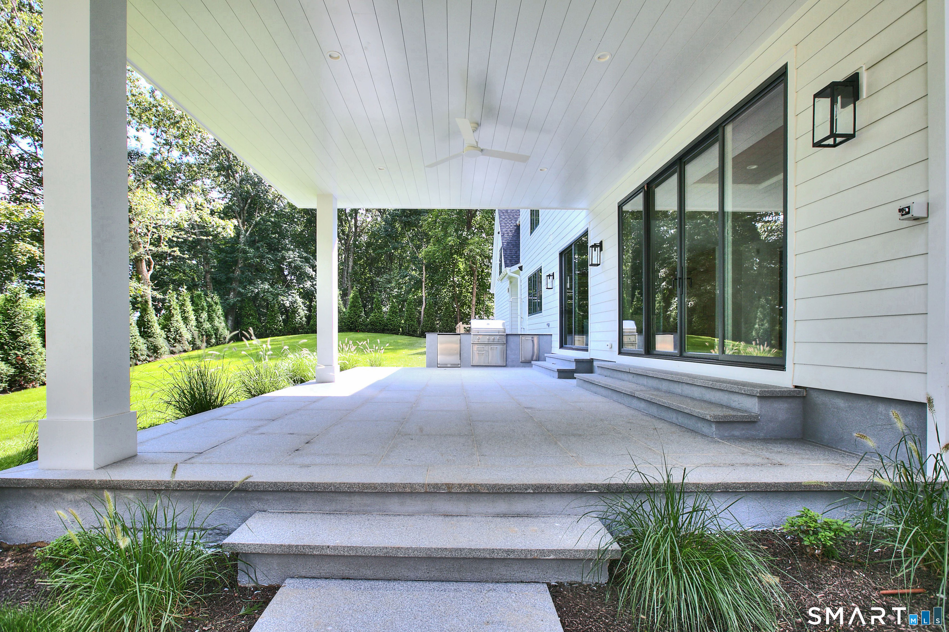 19 Mortar Rock Road Westport, CT 06880 - Photo 38 of 39 a house view with a garden space