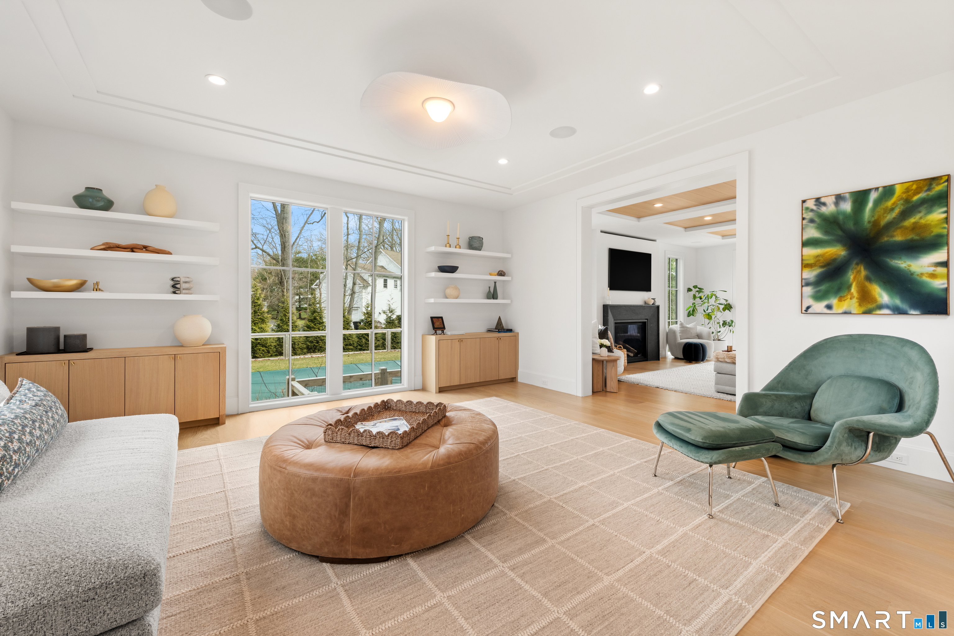 19 Mortar Rock Road Westport, CT 06880 - Photo 8 of 39 a living room with furniture and a floor to ceiling window