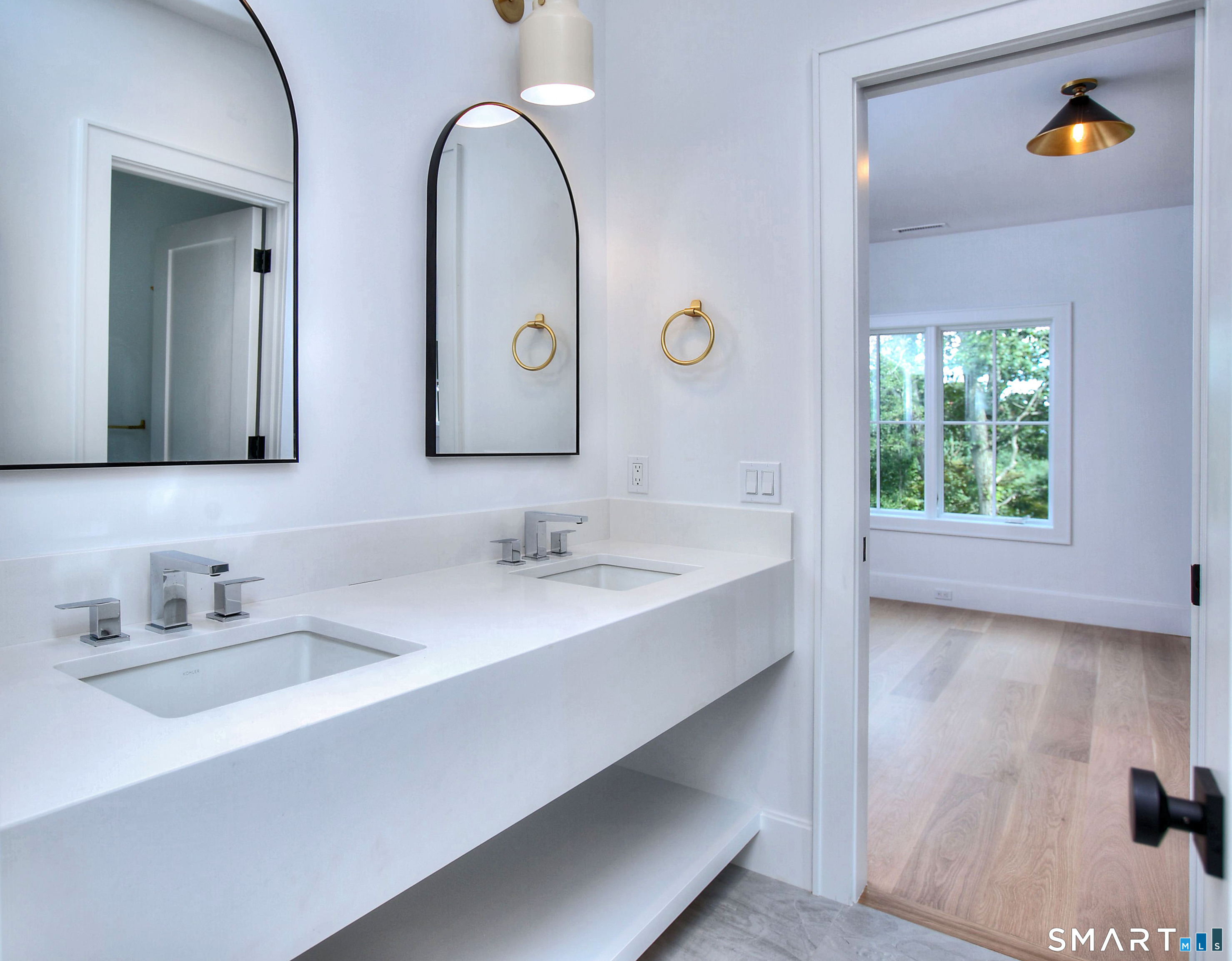 19 Mortar Rock Road Westport, CT 06880 - Photo 9 of 39 a bathroom with a sink and a mirror