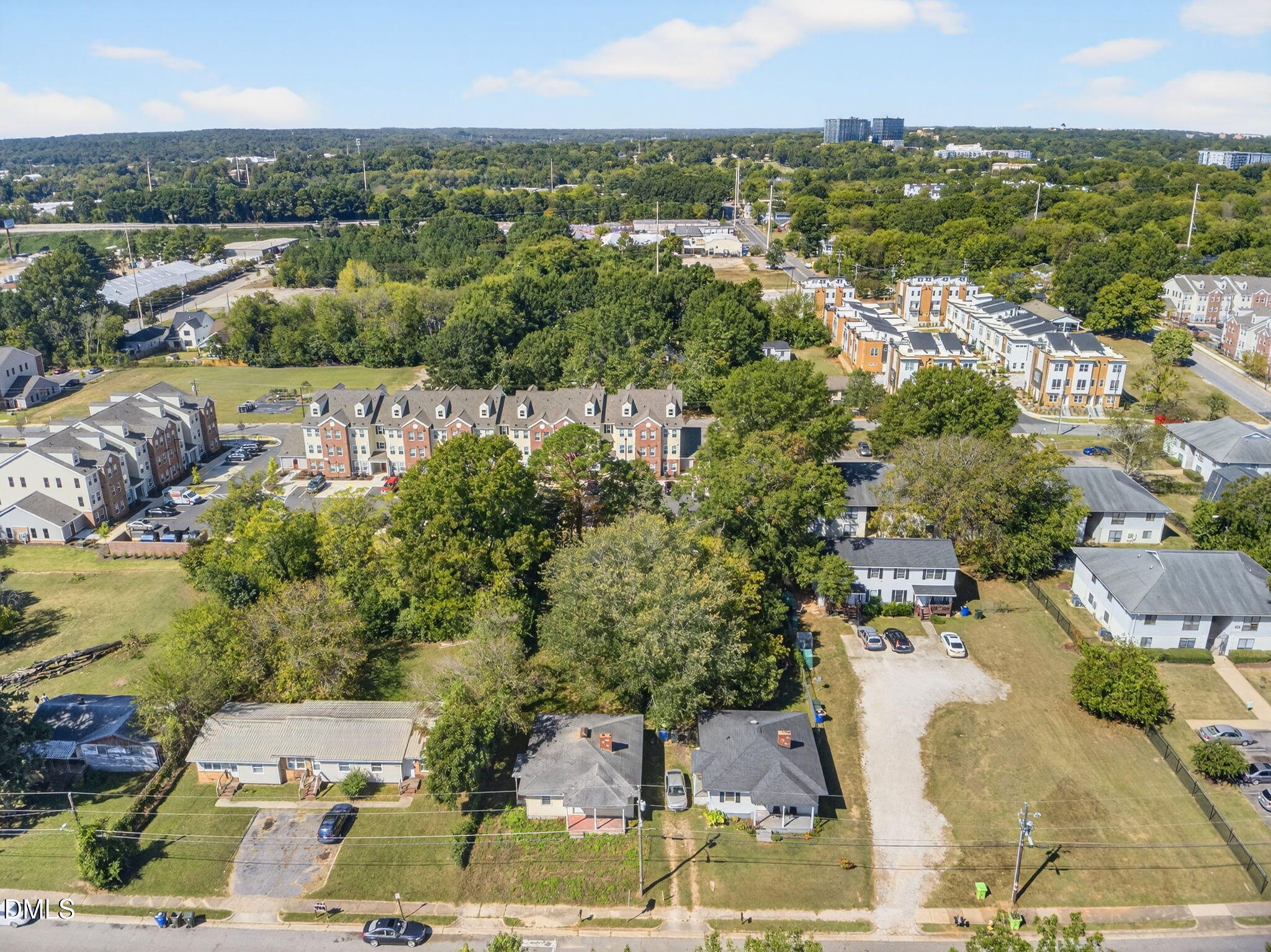 1422 Carnage Drive Raleigh, NC 27610 - Photo 21 of 33 an aerial view of a city with lots of residential buildings