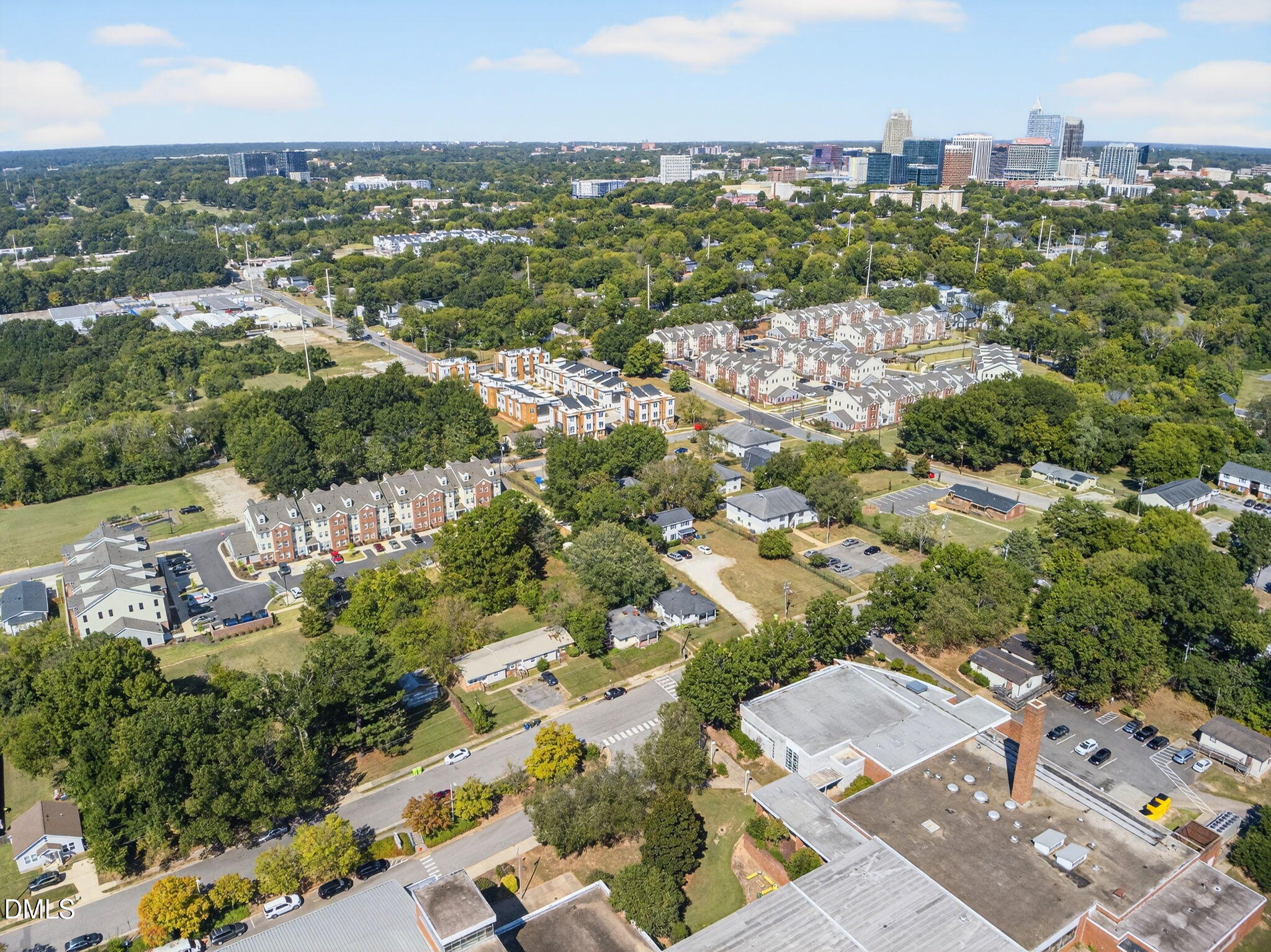 1422 Carnage Drive Raleigh, NC 27610 - Photo 30 of 33 an aerial view of a city with lots of residential buildings