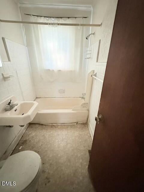 1422 Carnage Drive Raleigh, NC 27610 - Photo 38 of 45 a bathroom with a sink and a shower