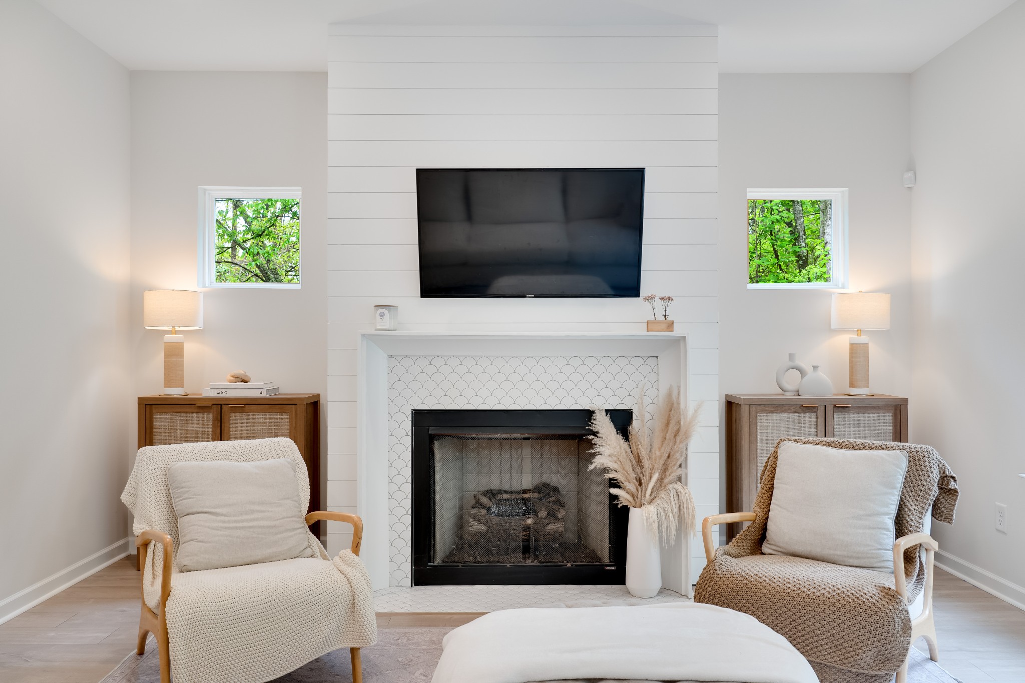 7301 Audubon Cove Fairview, TN 37062 - Photo 20 of 67 a living room with furniture a flat screen tv and a fireplace