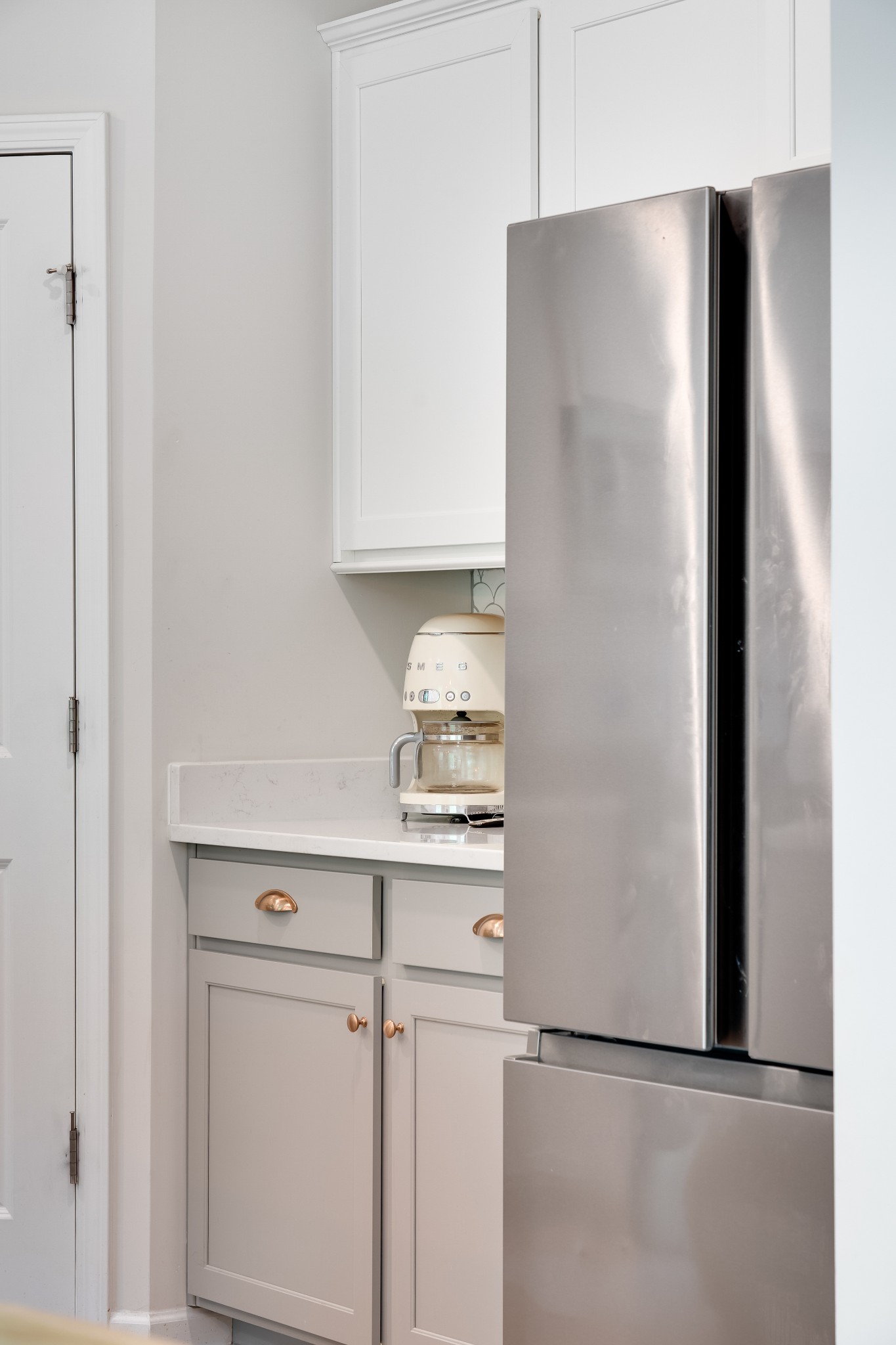 7301 Audubon Cove Fairview, TN 37062 - Photo 28 of 67 a white refrigerator freezer sitting inside of a kitchen