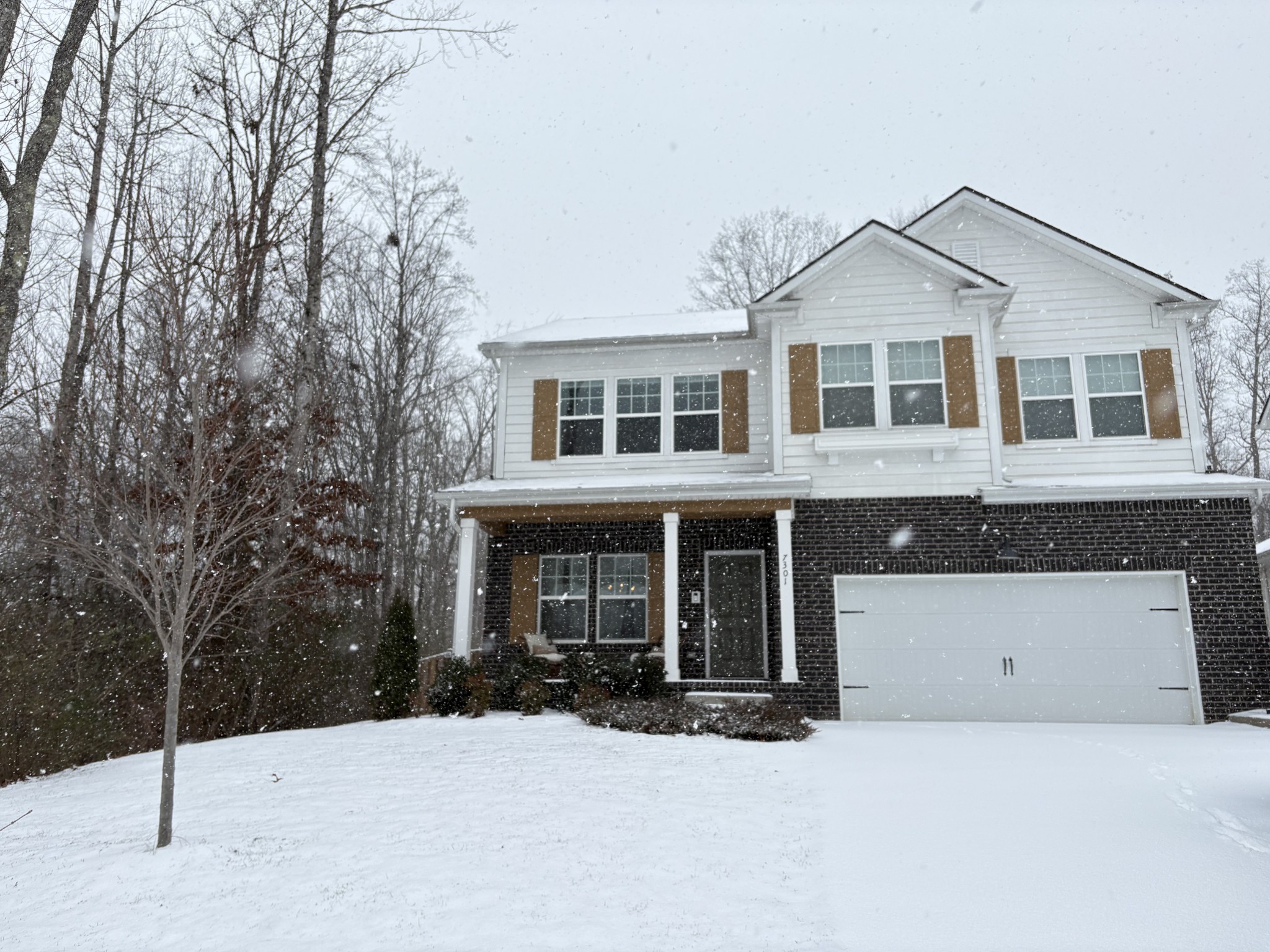 7301 Audubon Cove Fairview, TN 37062 - Photo 66 of 67 a front view of a house with a yard