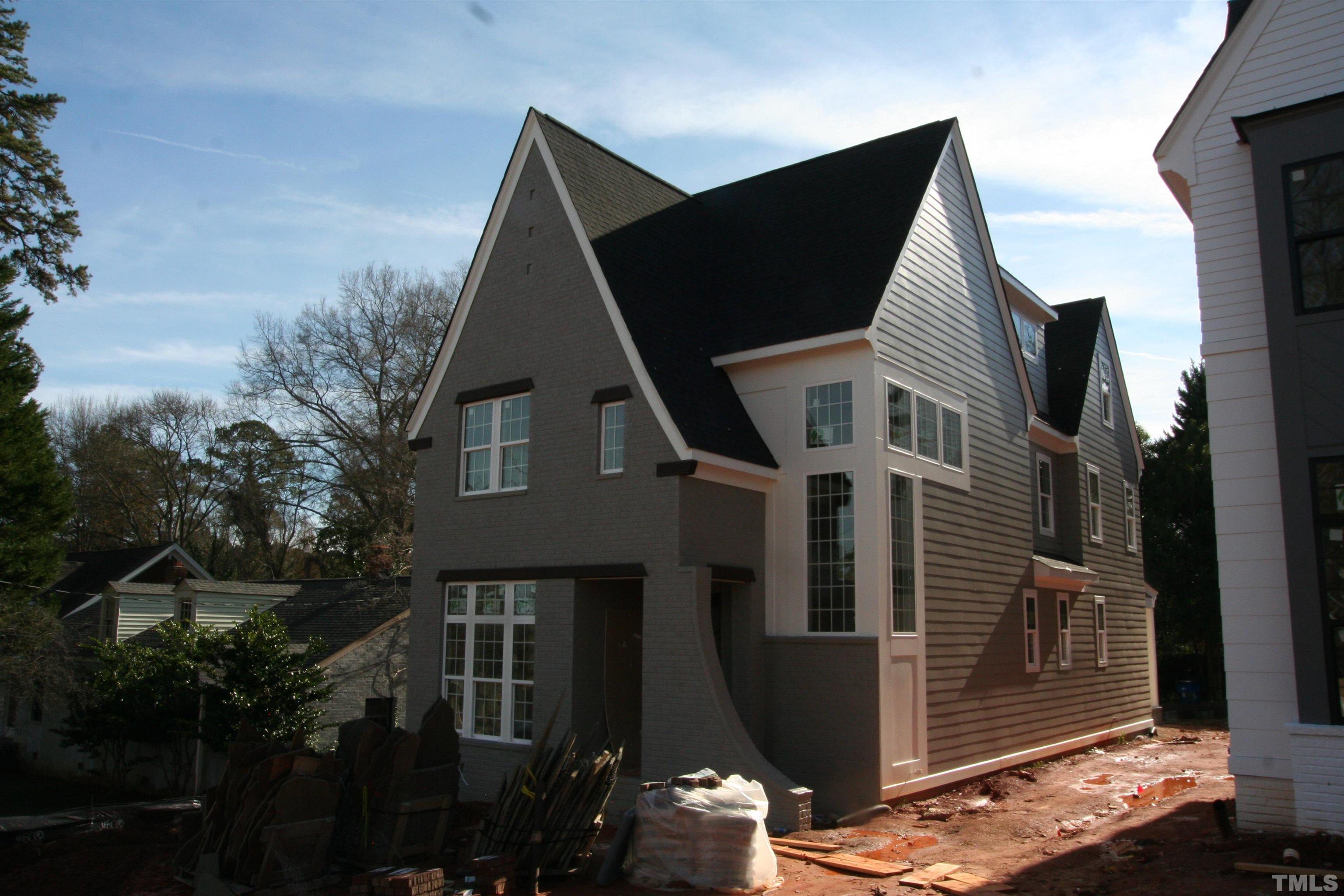 3025 Farrior Road Raleigh, NC 27607 - Photo 1 of 15 a view of a house with a balcony