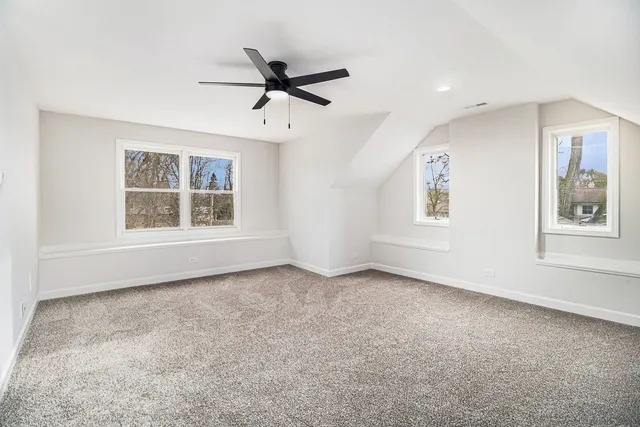 a view of a kitchen with a sink and a window