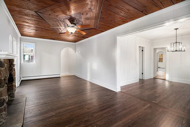 a view of a livingroom with wooden floor