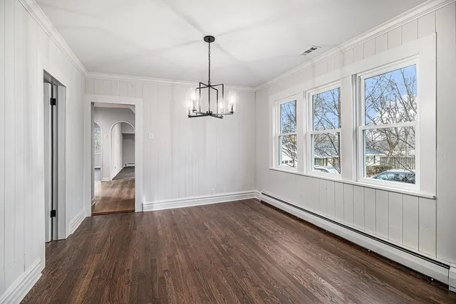 a kitchen with stainless steel appliances a refrigerator sink and cabinets