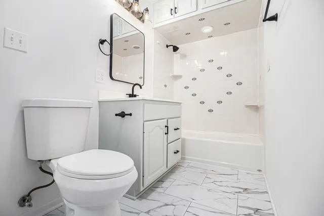 a view of an empty room with stairs