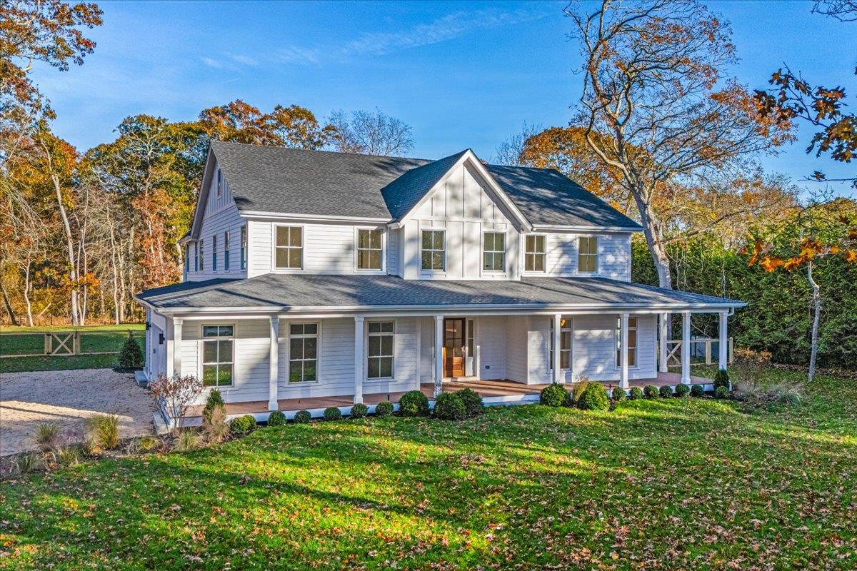 34 Jagger Lane Westhampton, NY 11977 - Photo 1 of 39 front view of a house with a yard