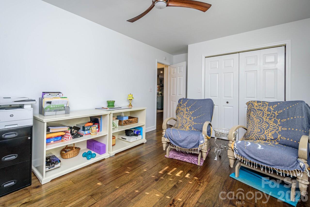 355 Mockingbird Drive Hendersonville, NC 28792 - Photo 32 of 45 a living room with furniture and a couch