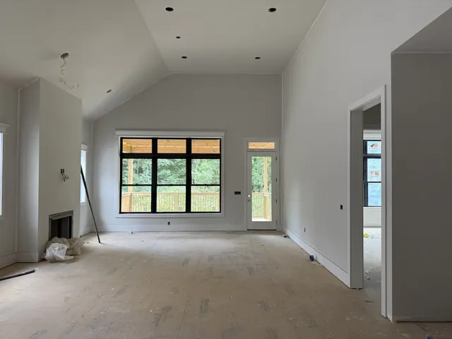 a view of a livingroom with a fireplace