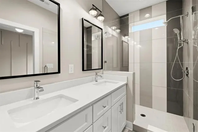 a view of a hallway with wooden floor and windows