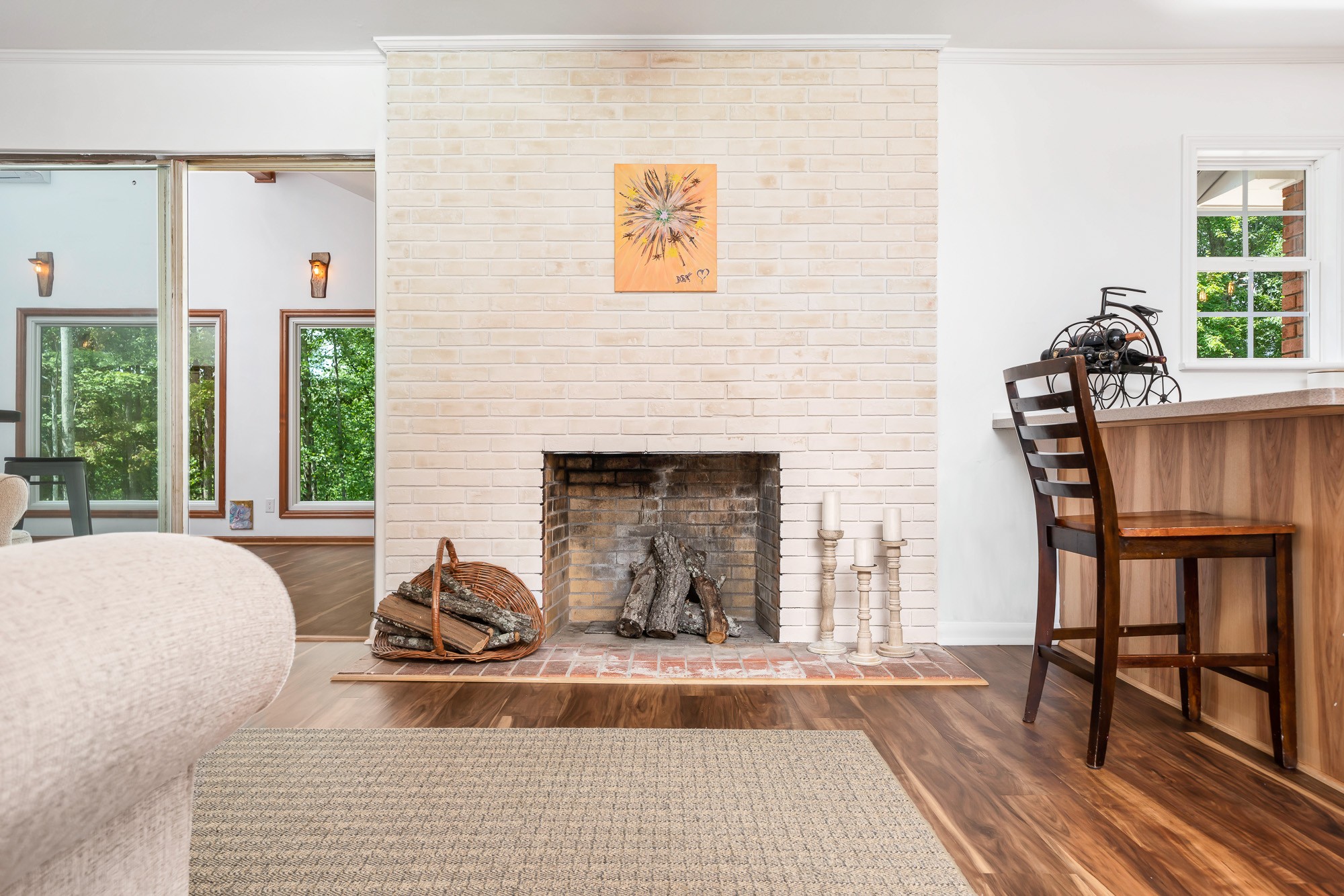 6045 Green Road Bloomington Springs, TN 38545 - Photo 12 of 42 a living room with furniture and a fireplace