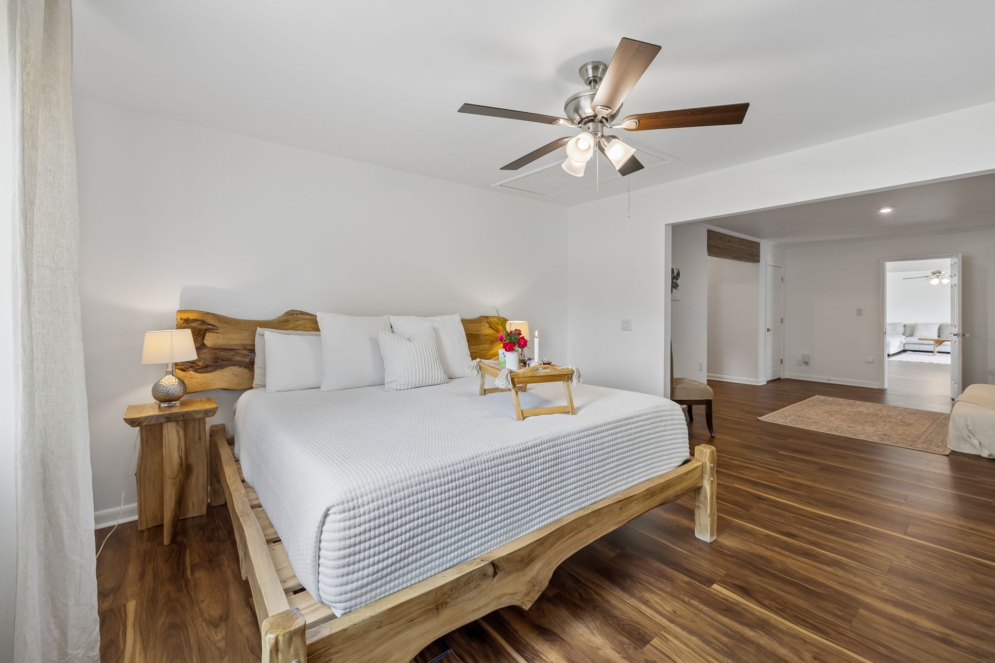 6045 Green Road Bloomington Springs, TN 38545 - Photo 20 of 45 a bedroom with a bed and wooden floor