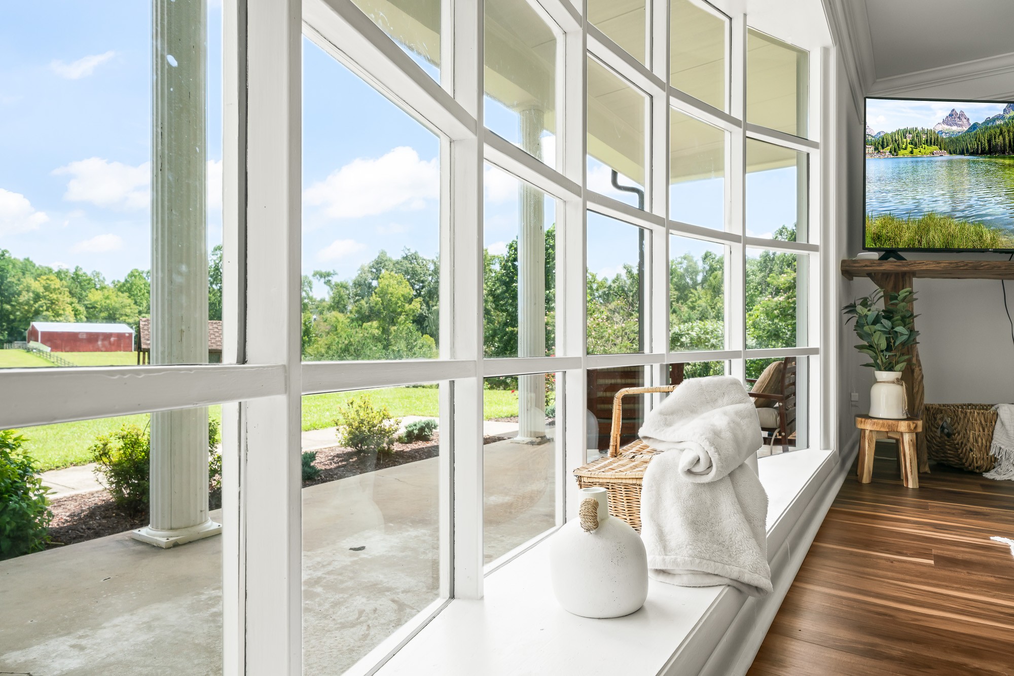 6045 Green Road Bloomington Springs, TN 38545 - Photo 6 of 42 a view of living room with furniture and floor to ceiling windows