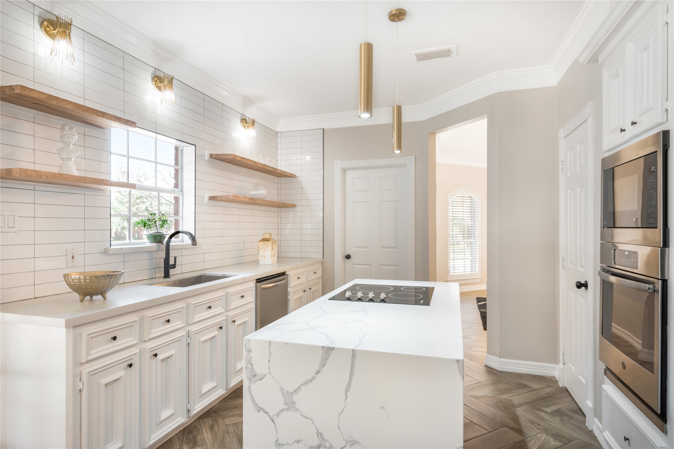 6211 Kingscrest Lane Spring, TX 77389 - Photo 15 of 38 a kitchen with cabinets appliances and a sink