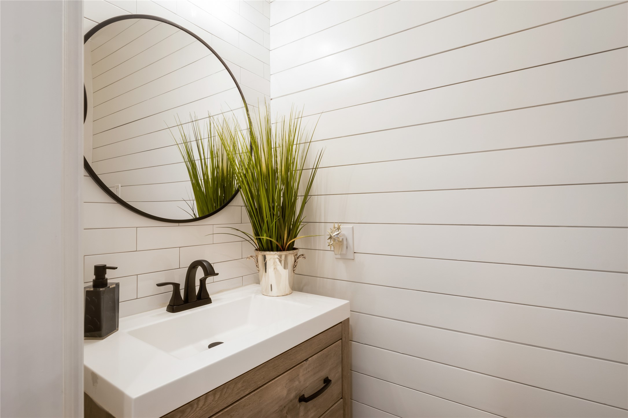 6211 Kingscrest Lane Spring, TX 77389 - Photo 18 of 38 a bathroom with a sink and a mirror