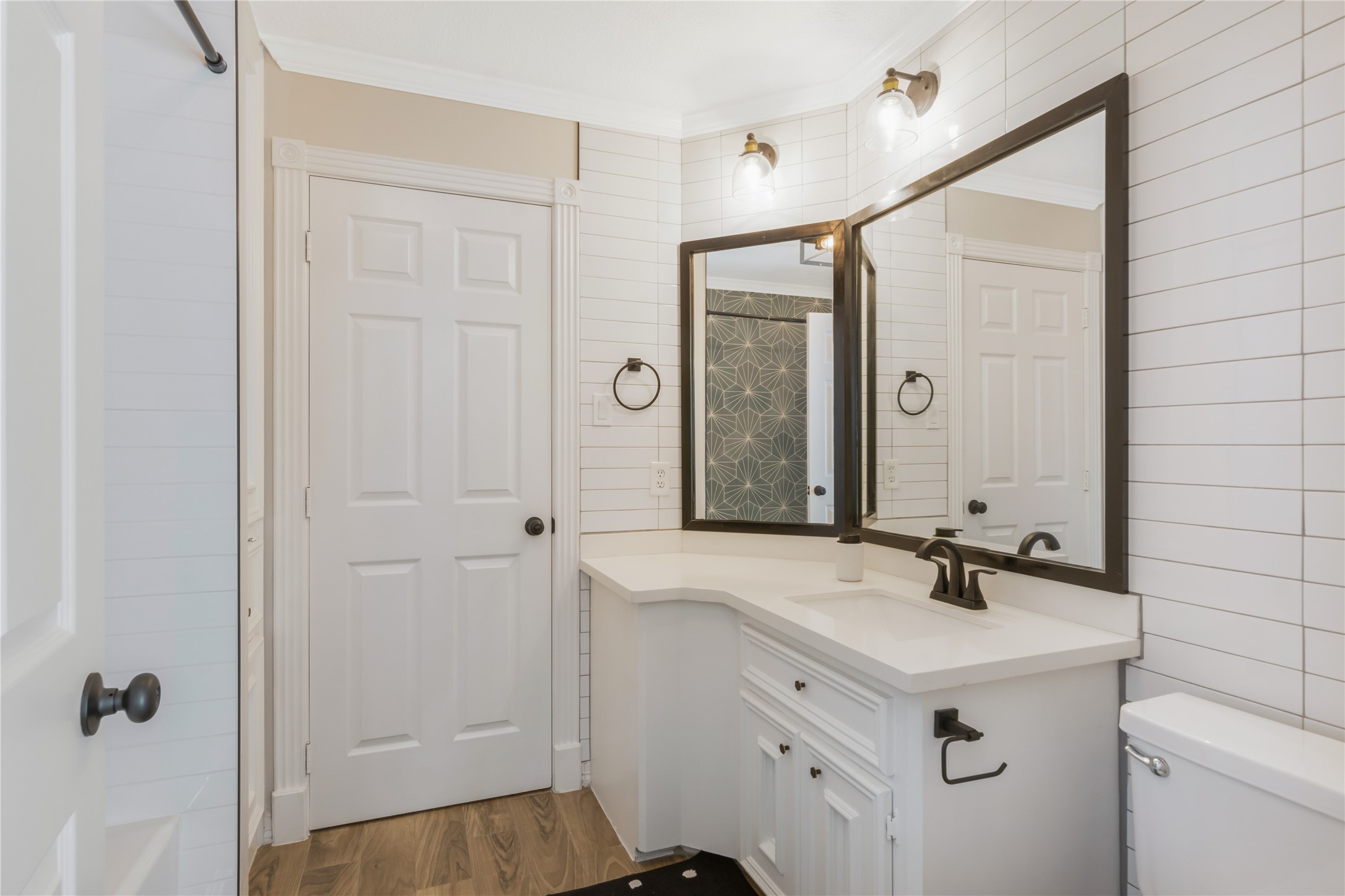 6211 Kingscrest Lane Spring, TX 77389 - Photo 27 of 38 a bathroom with a sink and a mirror