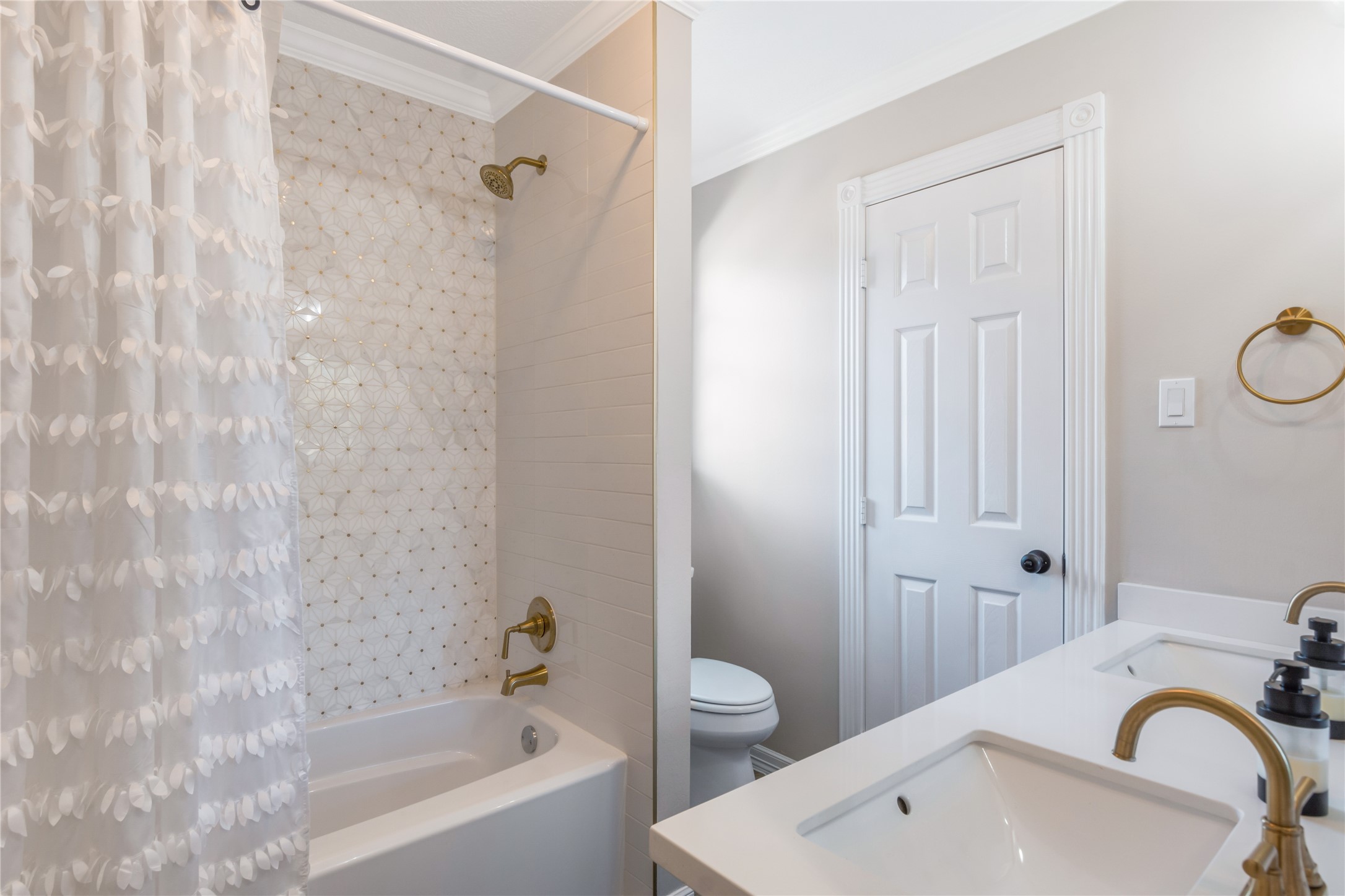 6211 Kingscrest Lane Spring, TX 77389 - Photo 31 of 38 a bathroom with a sink a toilet and shower