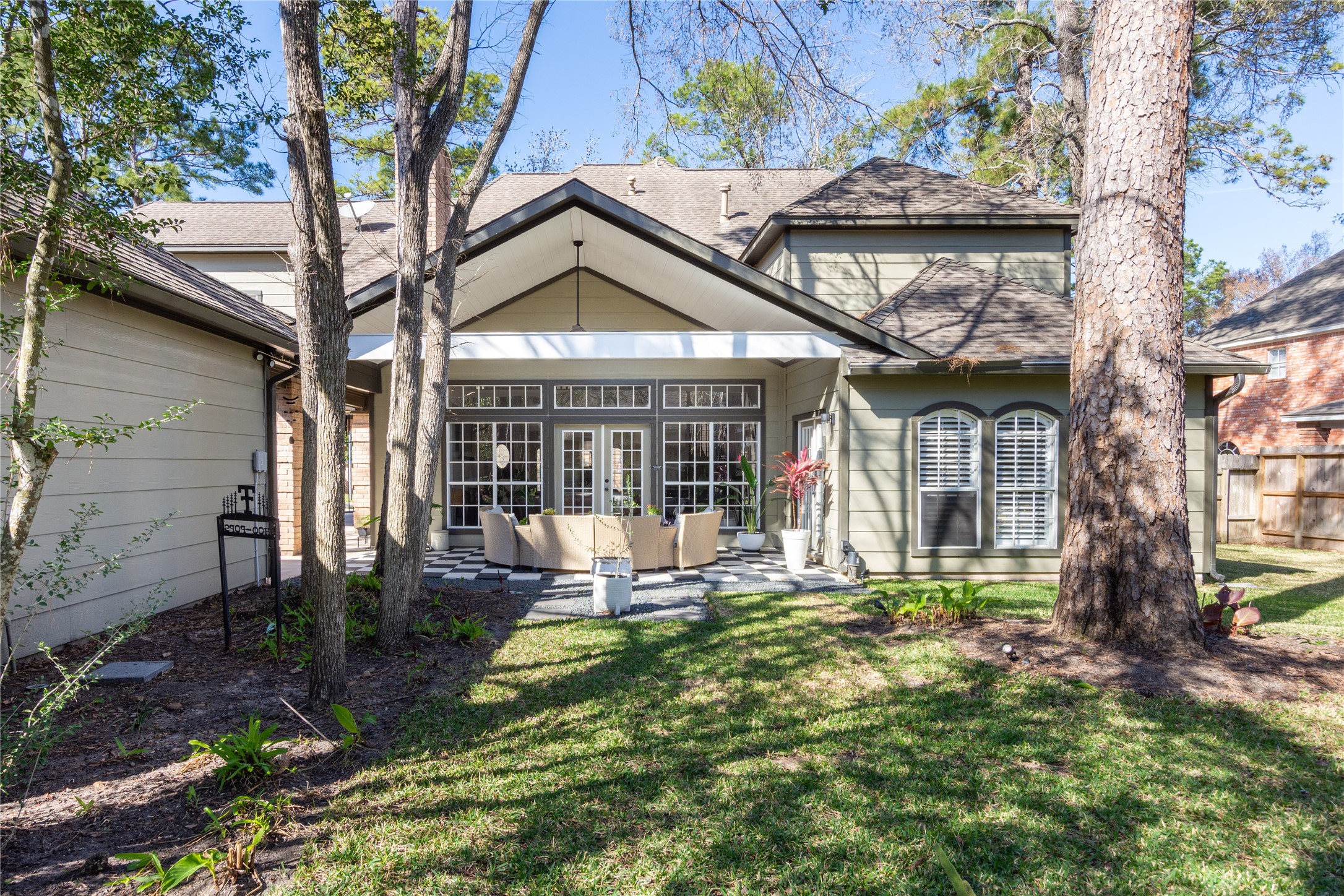 6211 Kingscrest Lane Spring, TX 77389 - Photo 35 of 38 front view of a house with a yard