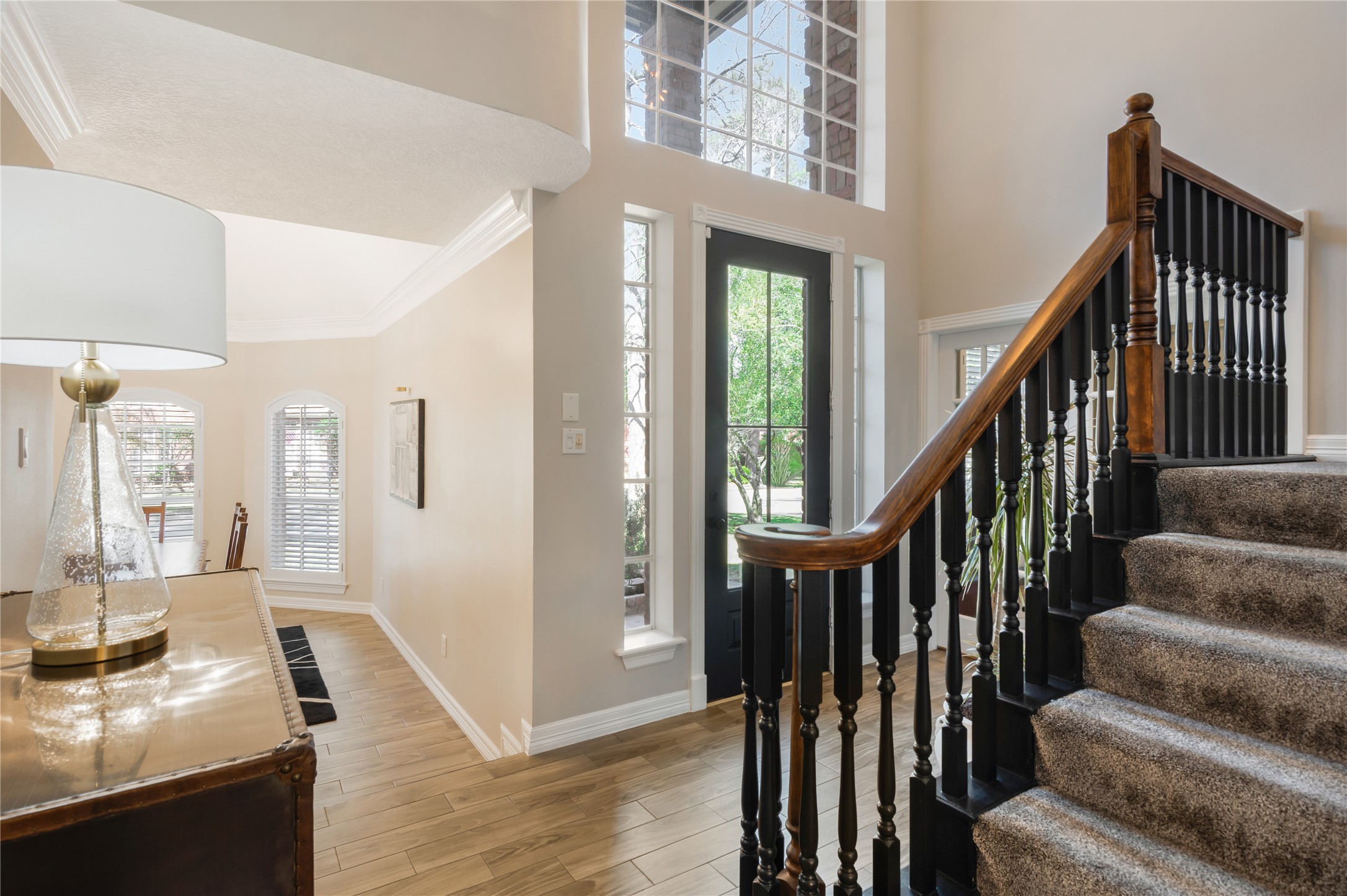 6211 Kingscrest Lane Spring, TX 77389 - Photo 4 of 38 a view of entryway and hall with wooden floor