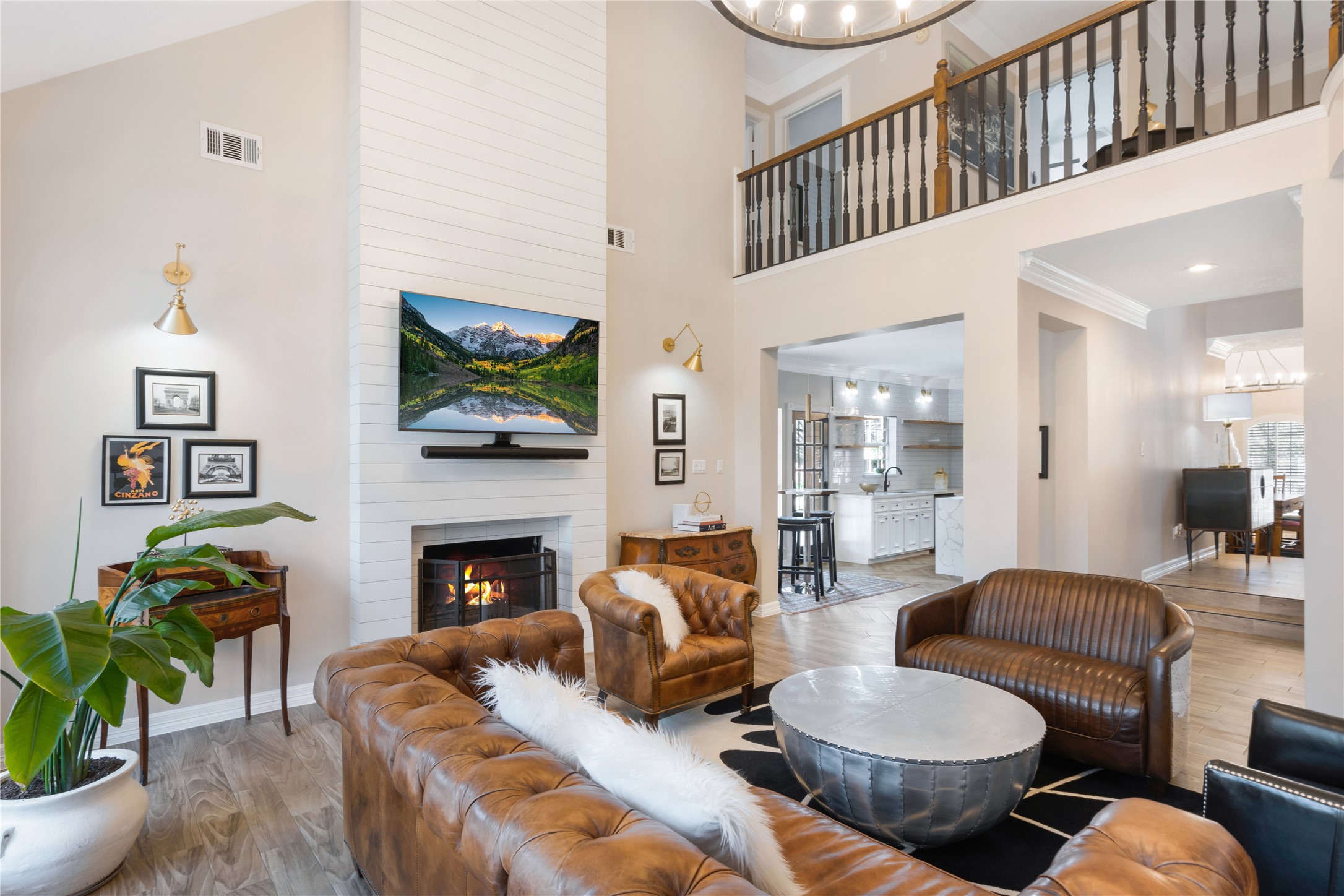 6211 Kingscrest Lane Spring, TX 77389 - Photo 10 of 38 a living room with furniture a fireplace and a flat screen tv