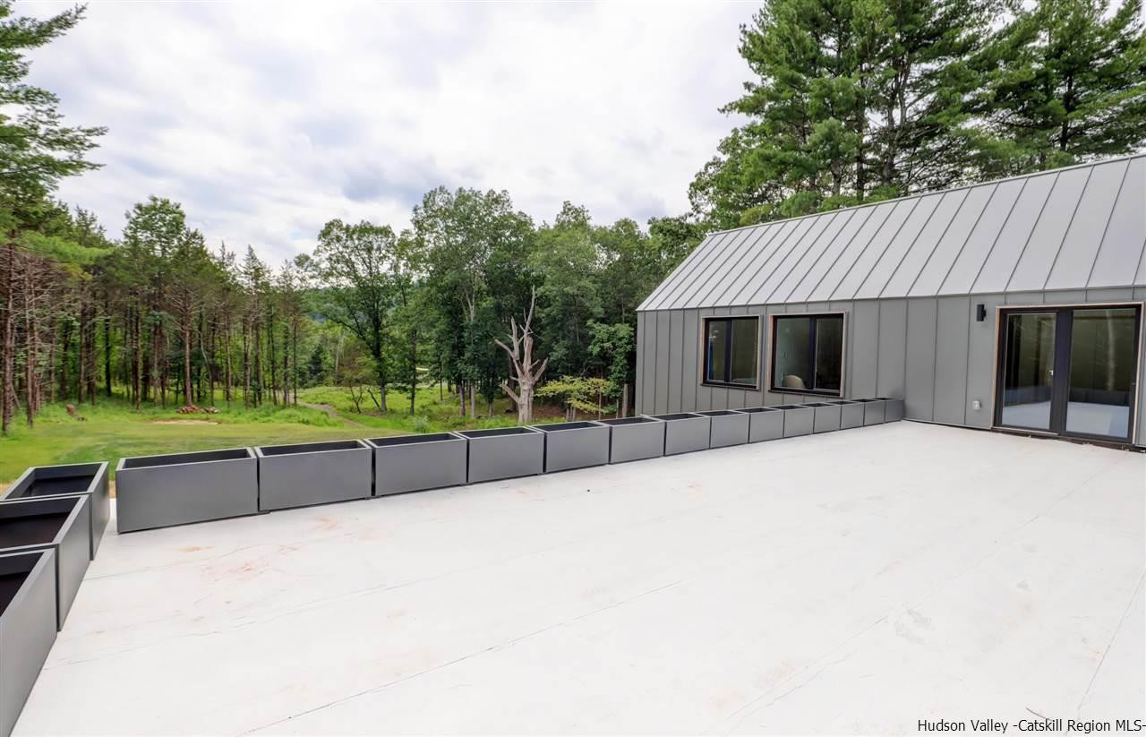 10 Old Runway Road Stone Ridge, NY 12484 - Photo 23 of 32 a view of a house with a outdoor space