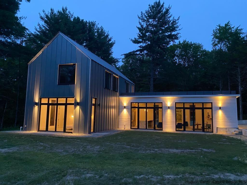 10 Old Runway Road Stone Ridge, NY 12484 - Photo 3 of 32 a front view of house with yard and green space
