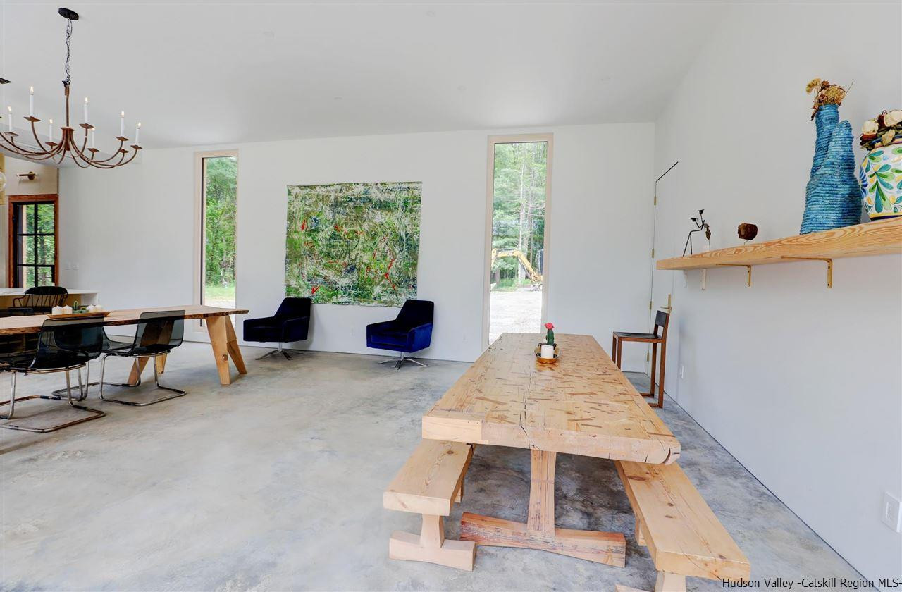 10 Old Runway Road Stone Ridge, NY 12484 - Photo 9 of 32 a living room with furniture a window and a table