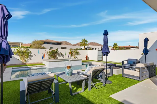 a view of a terrace with furniture