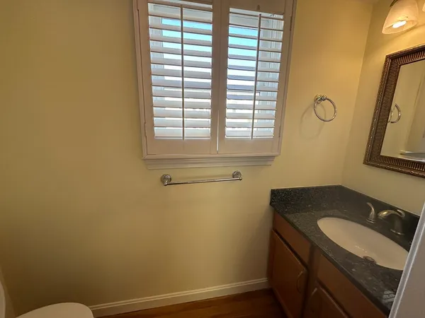 a bathroom with a sink and a vanity
