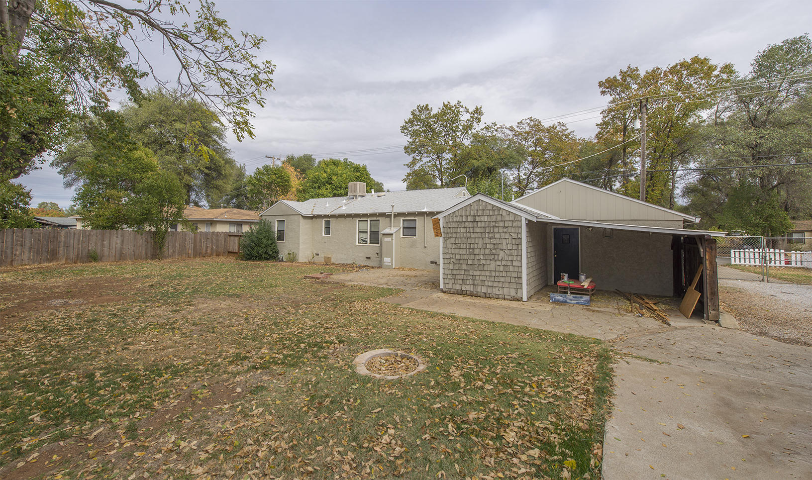 3062 Lawrence Road Redding, CA 96002 - Photo 13 of 16 a view of a house with backyard and a tree
