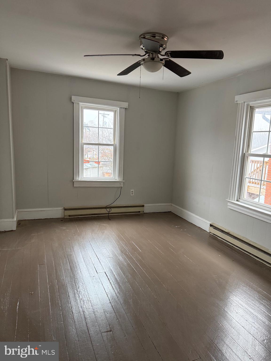 8 South Maple Avenue Brunswick, MD 21716 - Photo 5 of 13 an empty room with a window