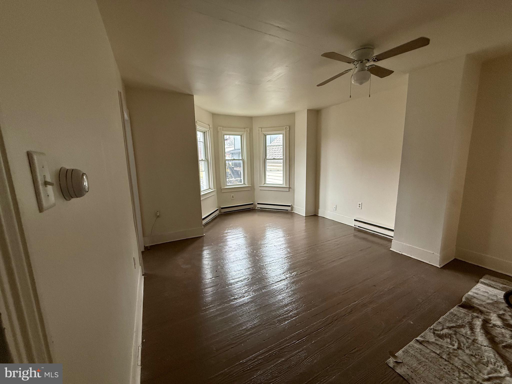 8 South Maple Avenue Brunswick, MD 21716 - Photo 10 of 13 a view of livingroom with hardwood