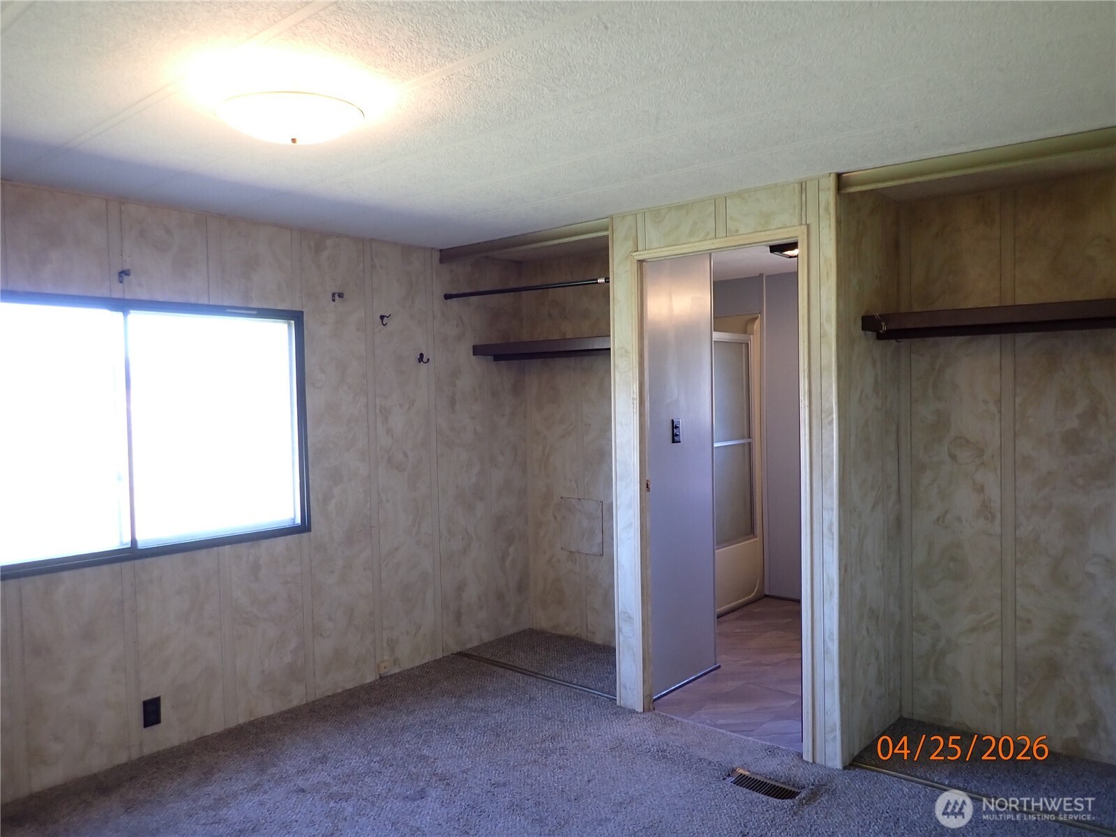 9217 183rd Avenue Southwest Rochester, WA 98579 - Photo 20 of 26 an empty room with windows and closet