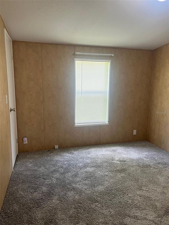 328 Old Peniel Road Palatka, FL 32177 - Photo 11 of 18 an empty room with a window