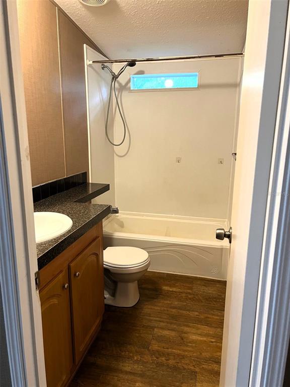 328 Old Peniel Road Palatka, FL 32177 - Photo 12 of 18 a bathroom with a granite countertop bathtub shower sink vanity and toilet